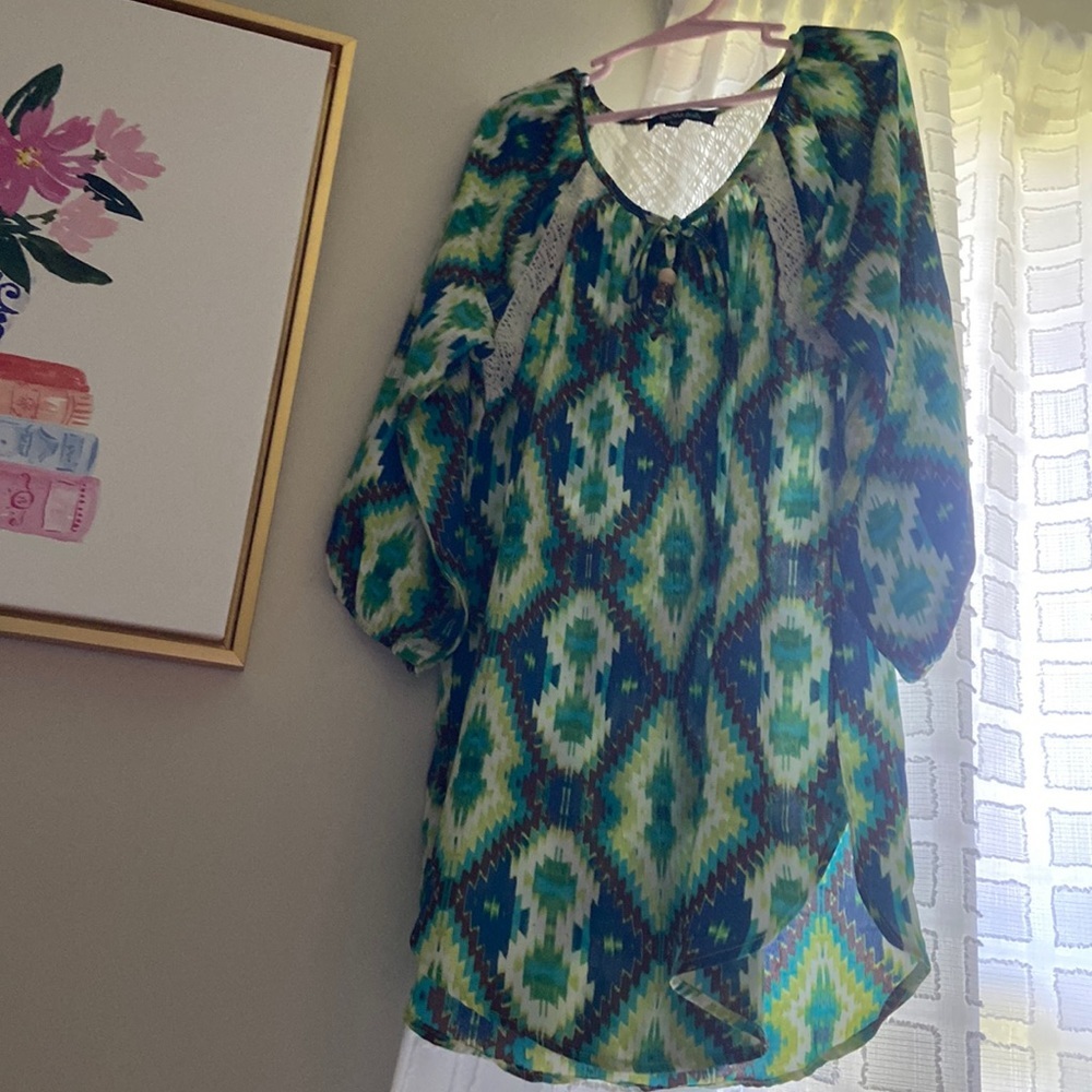 Girls blouse with a super cute design..